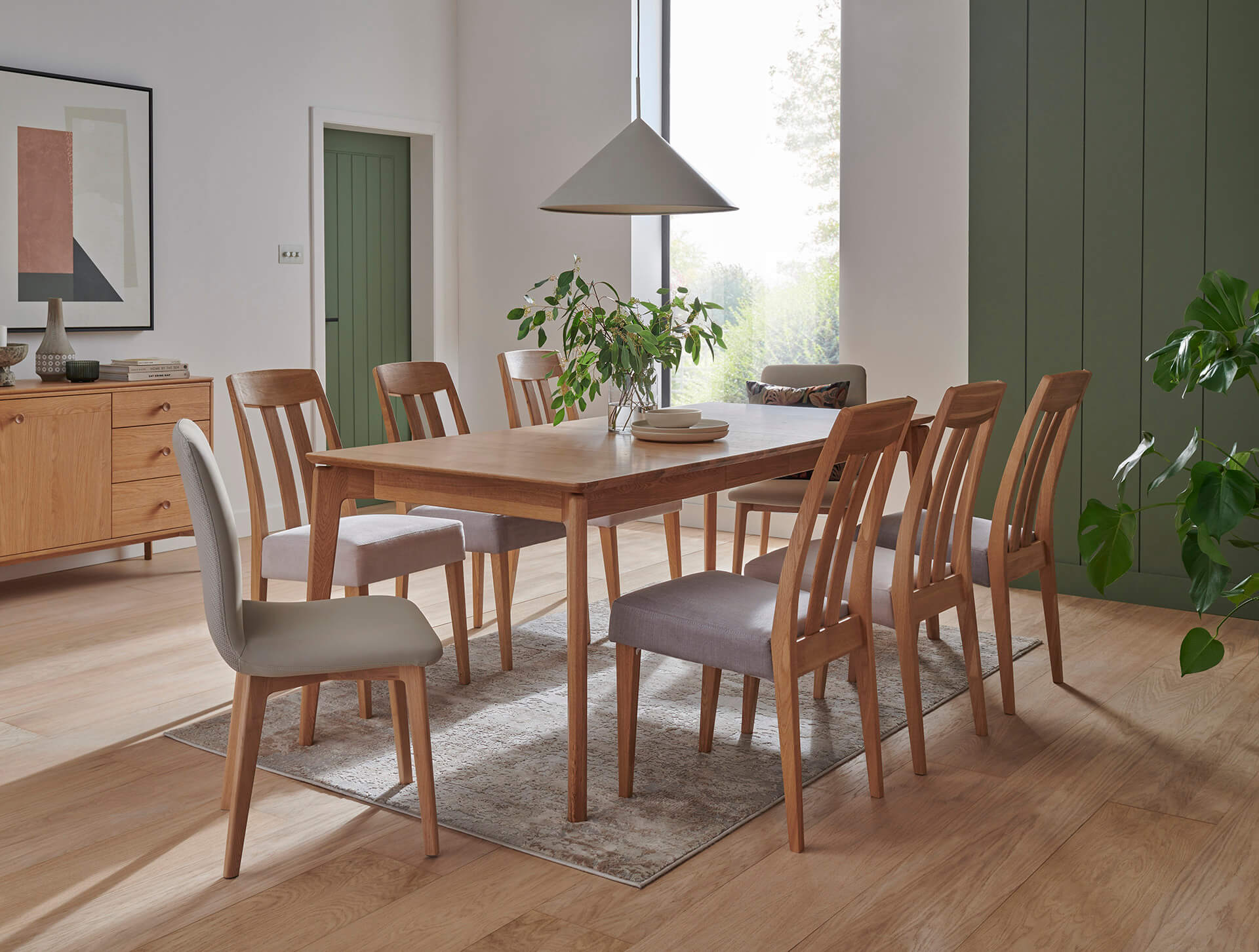 Hadley extending dining table and matching sideboard in a dining room setting