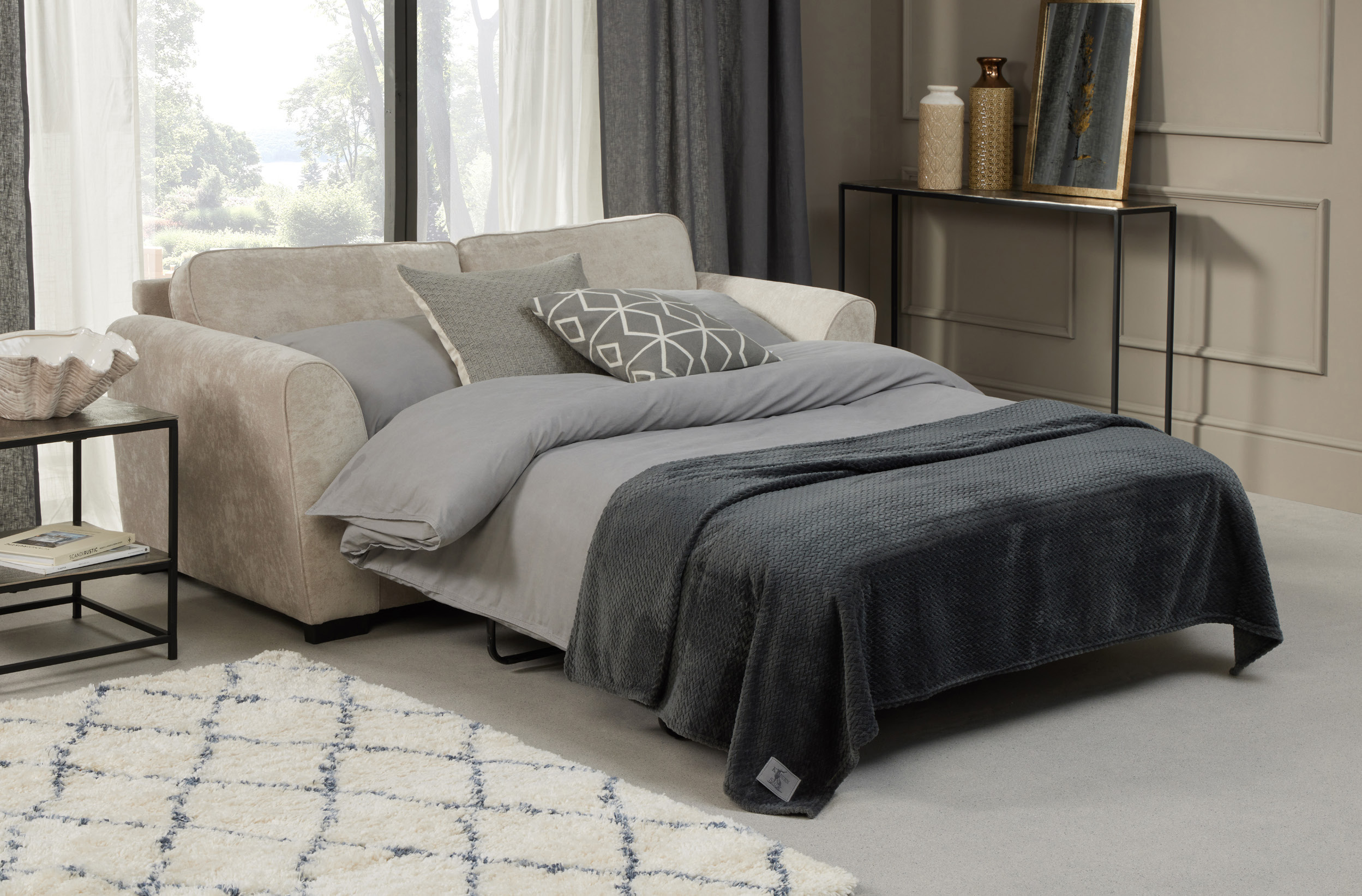 Roma sofa bed by Sofa Factory shown open in a neutral fabric